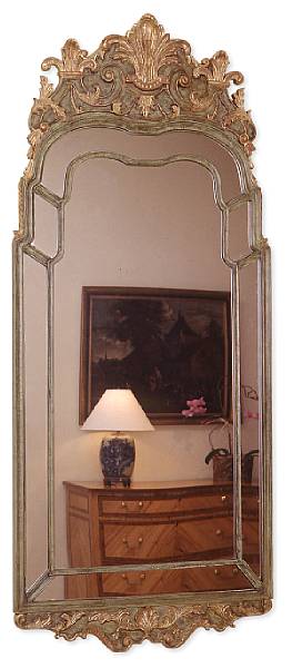 Appraisal: An English Regency style painted and giltwood mirror Boldly carved