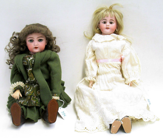 Appraisal: TWO BISQUE COLLECTOR DOLLS the first by Heinrich Handwerck German