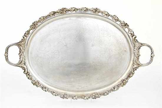 Appraisal: American silverplate footed serving tray late th century grapevine border