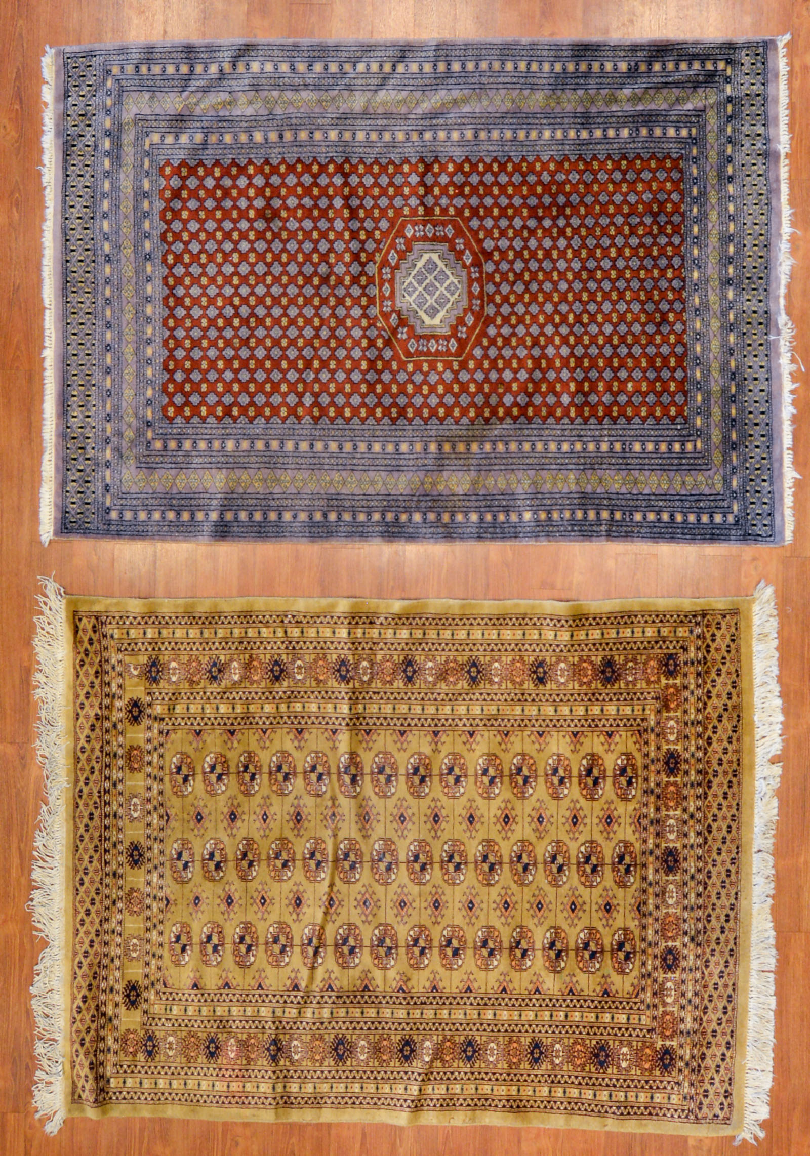 Appraisal: TWO BOKHARA RUGS PAKISTAN X X Fourth quarter- th century