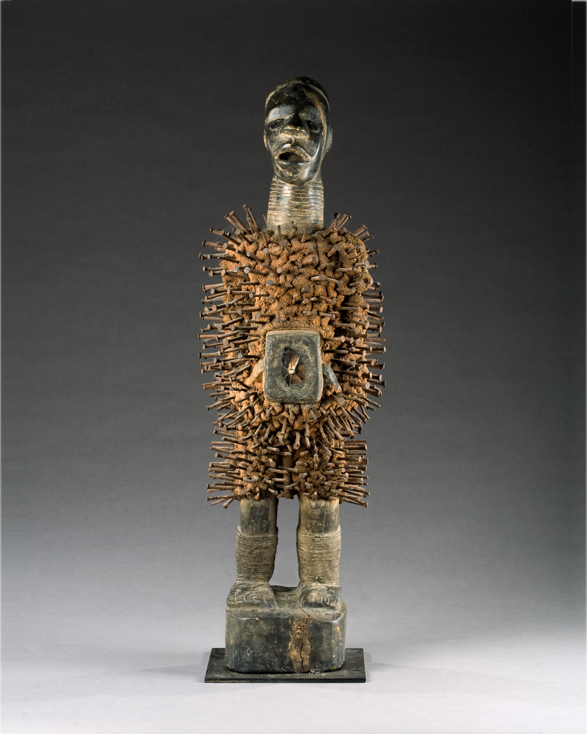 Appraisal: AFRICAN FIGURAL CARVED WOOD AND IRON FETISH Height inches