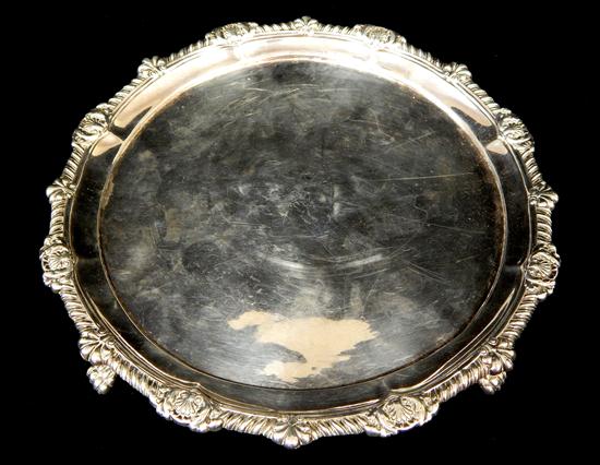 Appraisal: Irish silver salver raised on four paw feet partially illegible