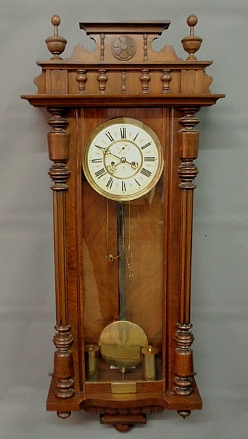 Appraisal: Walnut cased Vienna regulator clock the porcelain dial with Roman