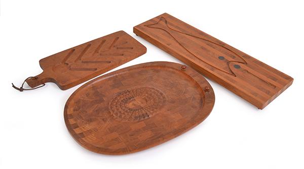 Appraisal: THREE PIECES OF DANISH TIMBER SERVING BOARDS c s by