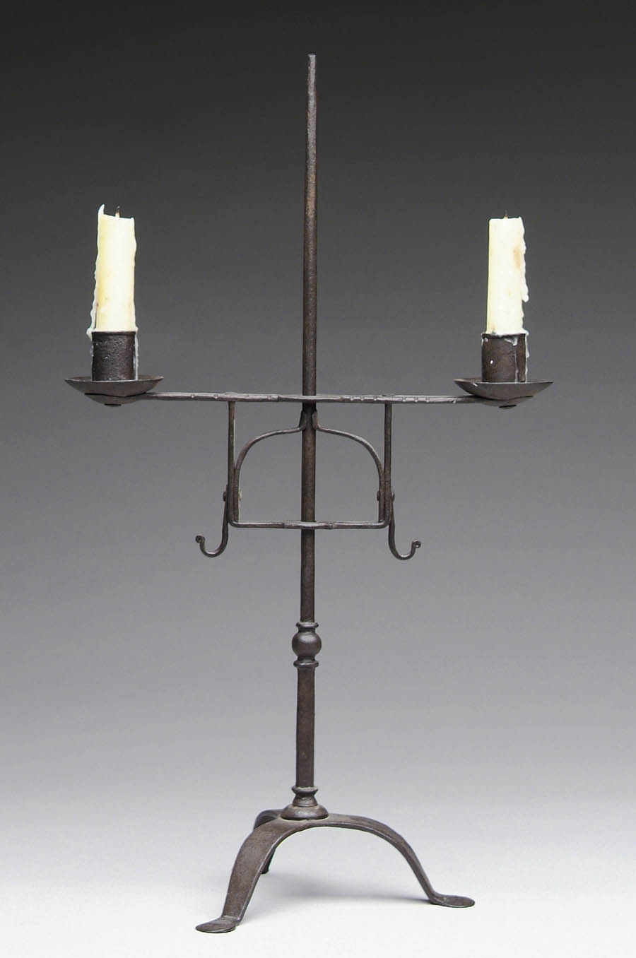 Appraisal: WROUGHT IRON TABLE TOP DOUBLE ADJUSTABLE CANDELABRA The center rod