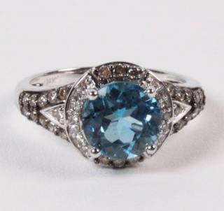 Appraisal: K DIAMOND AND BLUE TOPAZ RING K WHITE GOLD DIAMOND