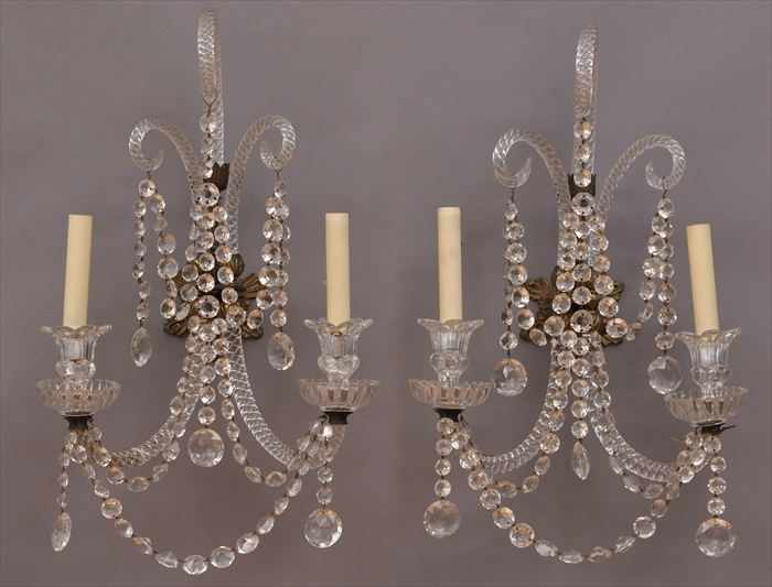 Appraisal: PAIR OF GEORGE III-STYLE GILT-METAL MOUNTED CUT-GLASS TWO-LIGHT WALL APPLIQUES