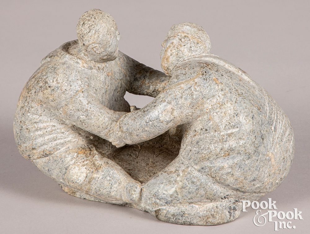 Appraisal: Alaskan Inuit stone carving of two seated figures Alaskan Inuit