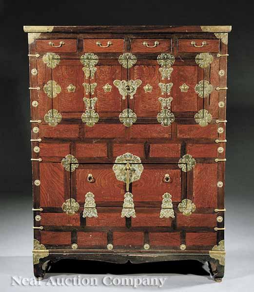 Appraisal: An Antique Korean Brass-Mounted Exotic Hardwood Ceremonial Cabinet the rectangular