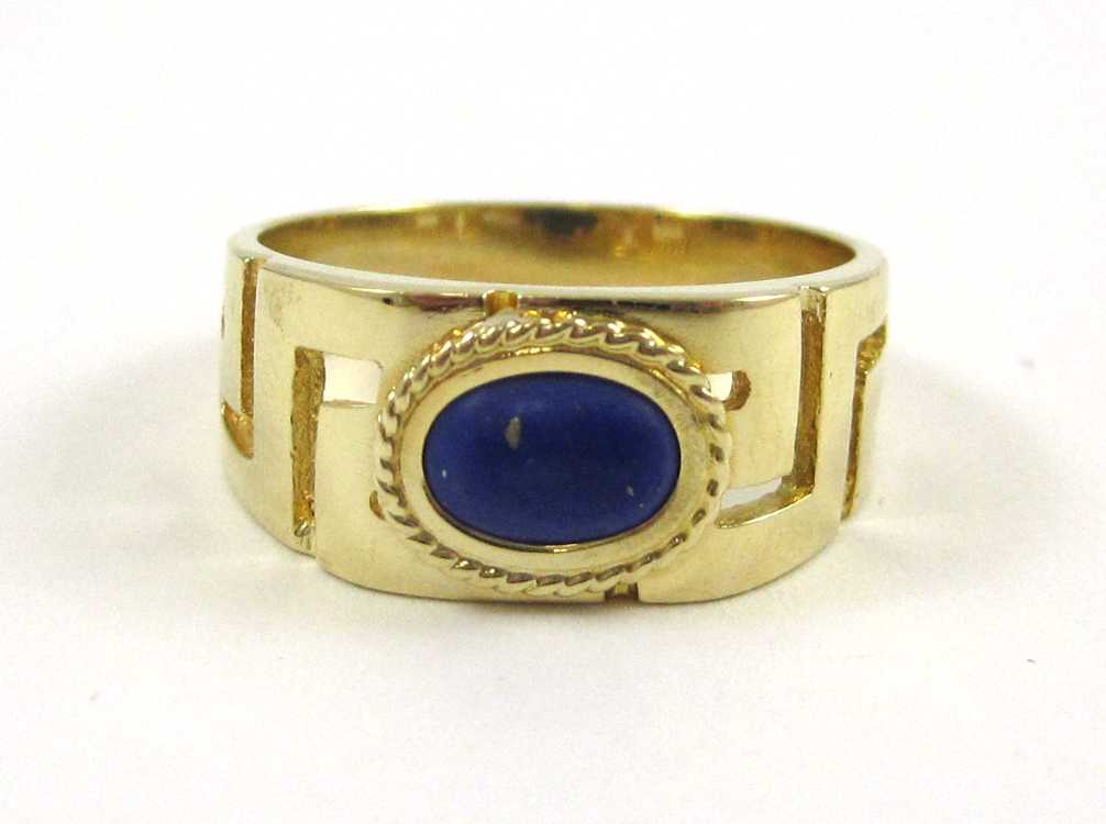 Appraisal: IMITATION LAPIS AND FOURTEEN KARAT GOLD RING set with a