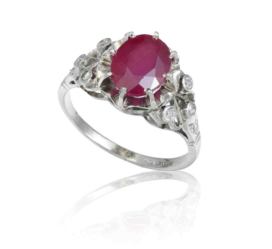 Appraisal: PLATINUM RUBY DIAMOND RING An approx Ct oval shaped mixed