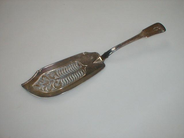 Appraisal: A George IV silver fiddle pattern fish slice with pierced