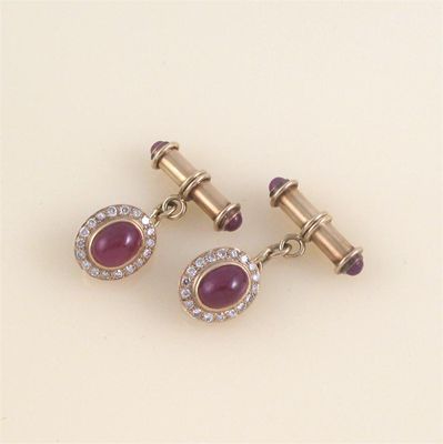 Appraisal: A pair of ruby and diamond cluster gold cuff links