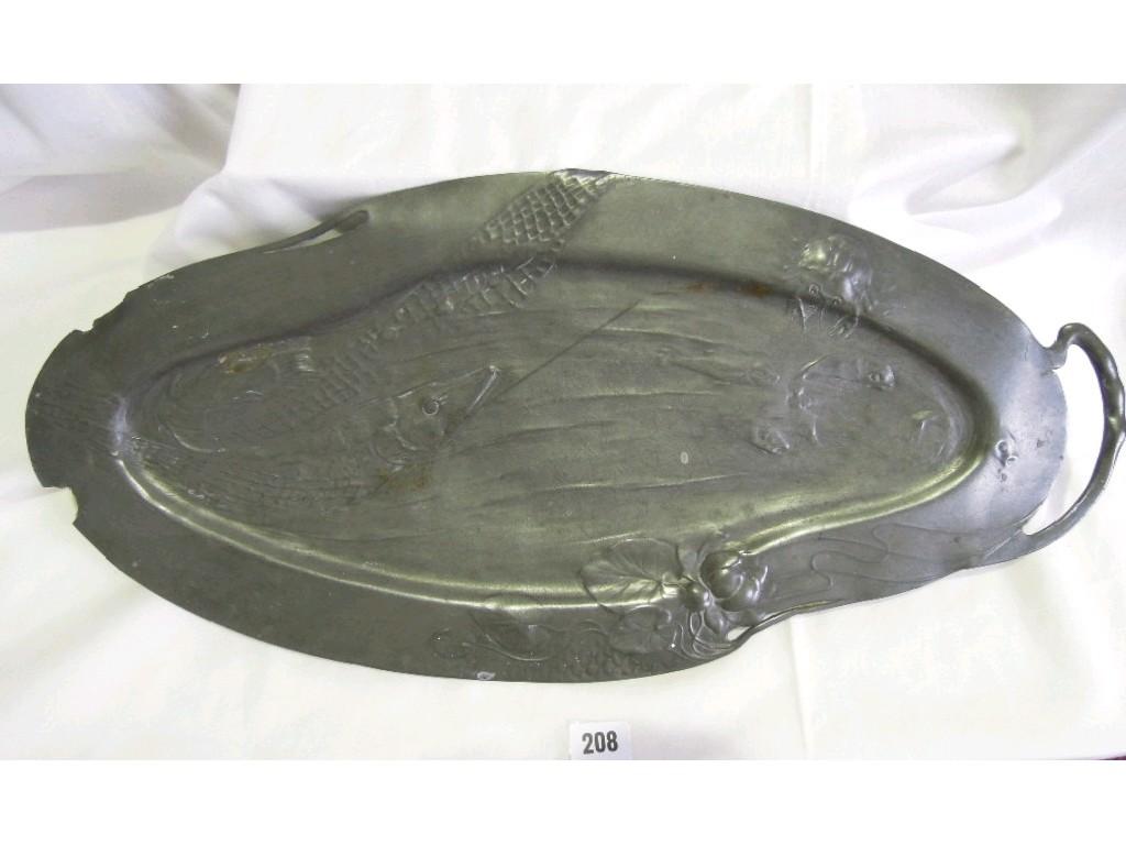 Appraisal: An early th century pewter tray with embossed decoration including