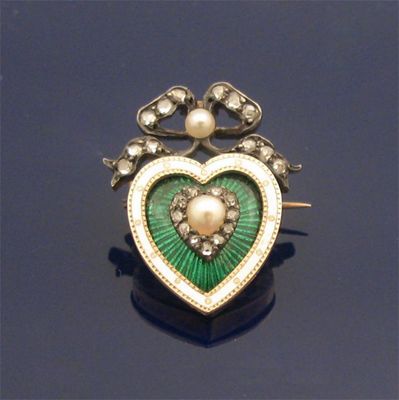 Appraisal: A Victorian heart brooch centred with a pearl within a