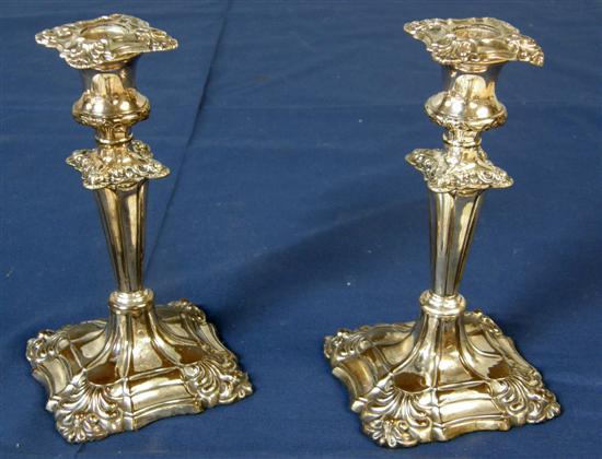 Appraisal: Pair of Old Sheffield plate candlesticks on shaped square bases