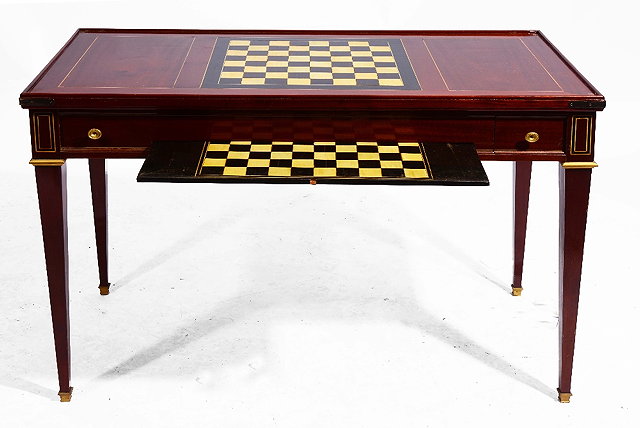 Appraisal: A LOUIS XVI STYLE MAHOGANY GAMES TABLE with backgammon and