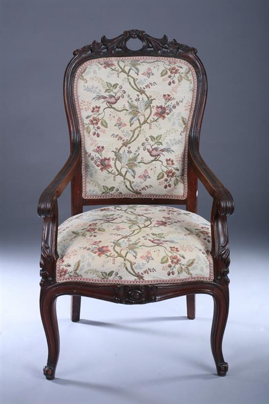 Appraisal: LOUIS XV STYLE FRUITWOOD FAUTEUILS th century with floral vine