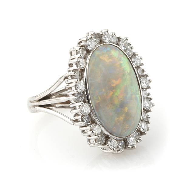 Appraisal: An oval opal diamond and k white gold ring estimated