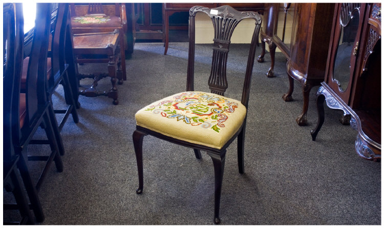 Appraisal: Two Edwardian Walnut Chairs On Cabriole Legs with pierced and