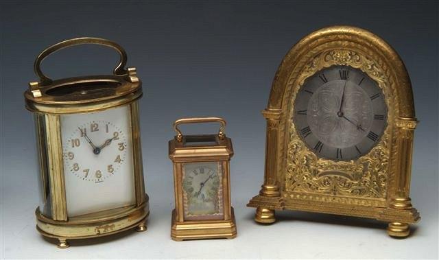 Appraisal: A FRENCH BRASS MINIATURE CARRIAGE TIMEPIECE with pink ground porcelain