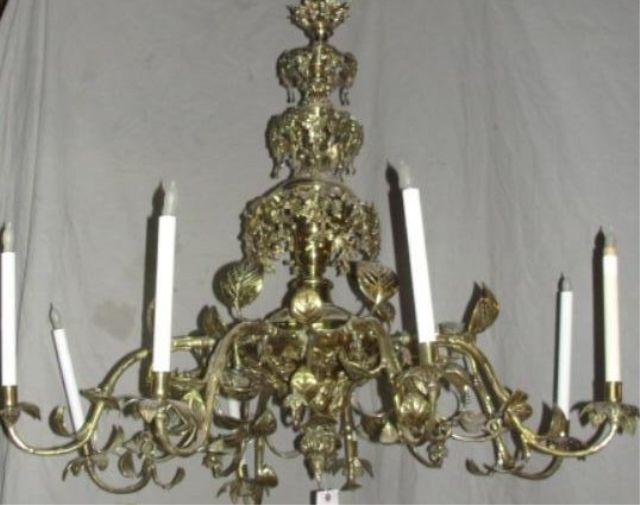 Appraisal: Ornate Leaf-Festooned Brass Arm Chandelier Extremely decorative With a section