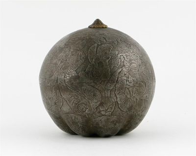 Appraisal: A Middle Eastern iron model of a fruit the surface