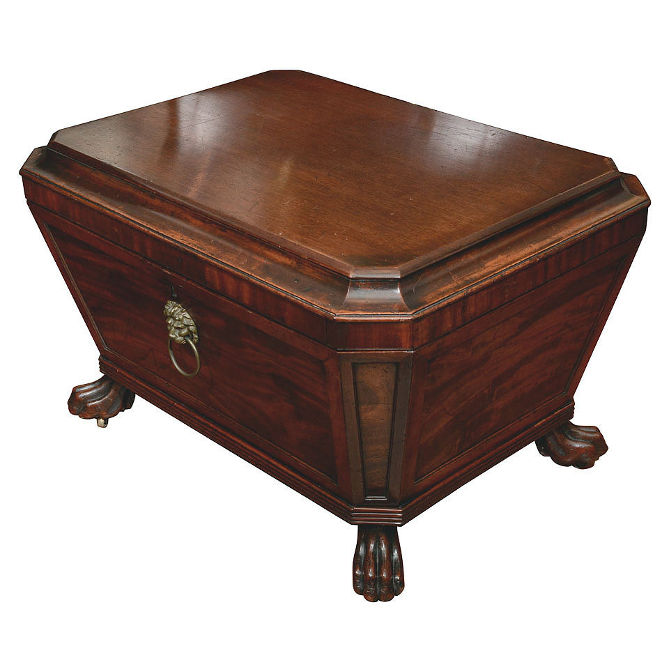 Appraisal: Late Regency Mahogany Cellarette Circa The hinged canted rectangular top