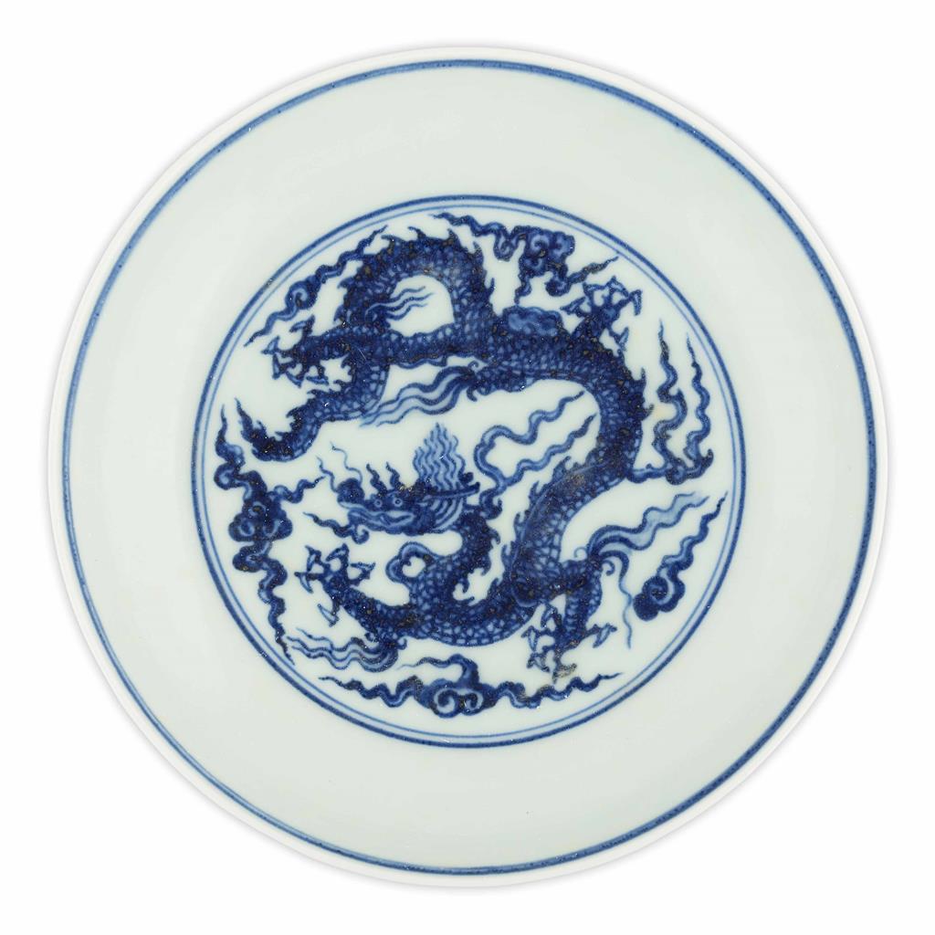 Appraisal: BLUE AND WHITE 'DRAGON' DISH decorated to the interior with