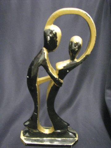 Appraisal: Deco Style Metal Statue of Man Woman dancing