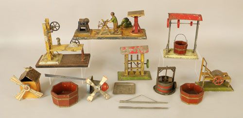 Appraisal: Seven tin lithograph steam driven toy accessories early th c