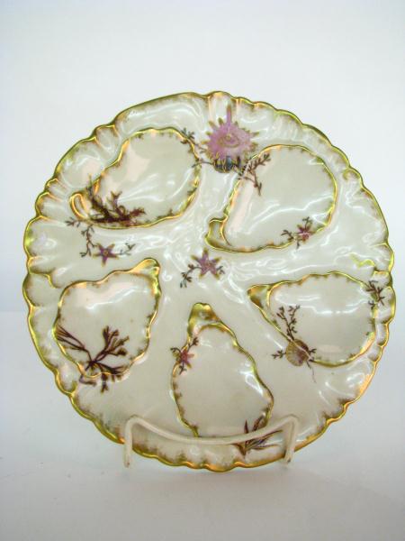 Appraisal: Six Haviland Limoges Oyster Plates with gold trim and painted