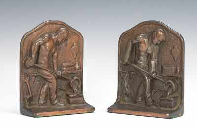 Appraisal: A Pair of Cast Iron Bookends Bracket shape heavy cast