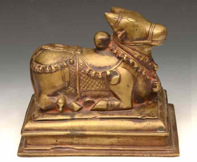 Appraisal: AN INDIAN PROBABLY SOUTH INDIA BRONZE MODEL OF A CEREMONIAL