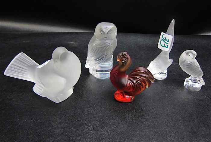 Appraisal: FIVE LALIQUE CRYSTAL BIRD FIGURINES four clear and frosted heights