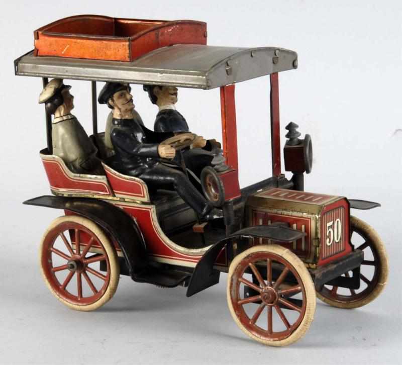 Appraisal: Tin Litho Carette No Automobile Toy Description German Original rubber