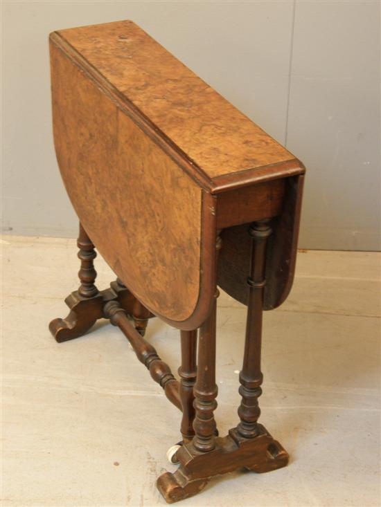 Appraisal: Late Victorian walnut Sutherland table on turned supports and scroll