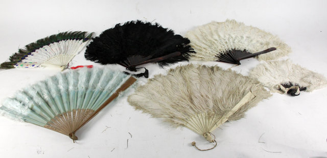 Appraisal: An ostrich feather fan with tortoiseshell sticks and five other