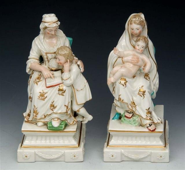 Appraisal: A PAIR OF DERBY PORCELAIN FIGURES portraying seated mothers with