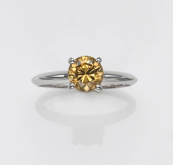 Appraisal: An orange-brown diamond and k white gold ring diamond weighing