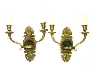 Appraisal: A pair of Continental neo-classical style twin branch wall lights