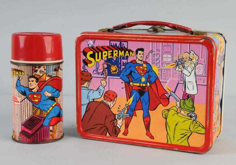 Appraisal: Tin Superman Lunchbox with Thermos Description Made by King-Seeley Marked