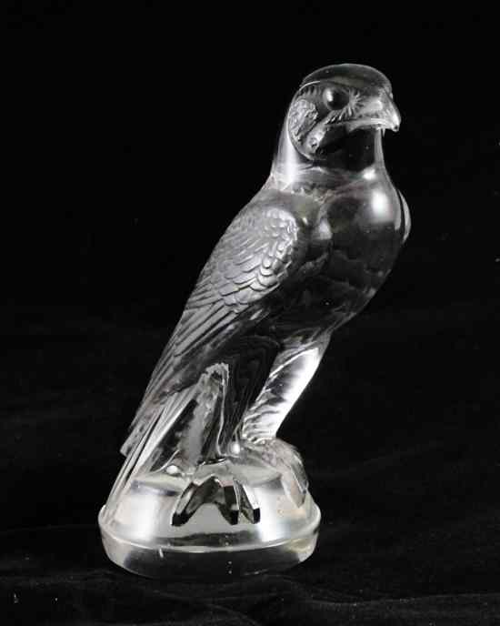 Appraisal: A Lalique amethyst tinted glass faucon car mascot impressed R