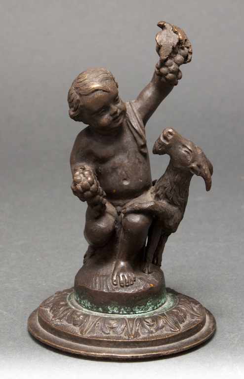 Appraisal: Continental patinated bronze figural group of a putti and goat