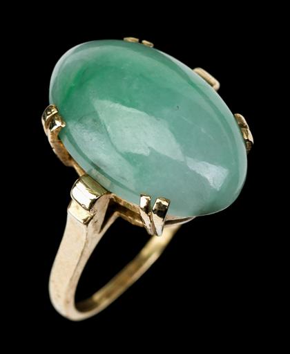 Appraisal: Good Chinese jadeite and k yellow gold ringearly th century