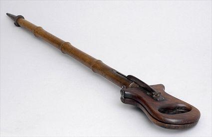 Appraisal: ENGLISH WALNUT COMBINATION WALKING STICK AND FIELD SEAT The iron-mounted