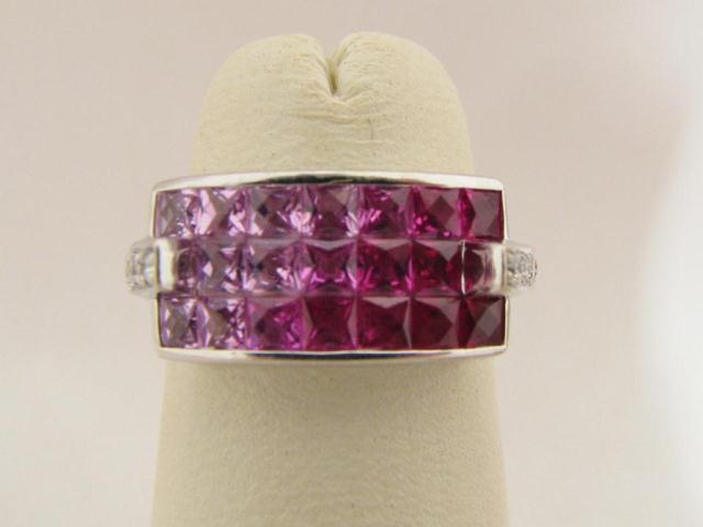 Appraisal: LeVian k white gold ring with invisible set sapphires that