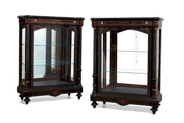 Appraisal: A pair of Napoleon III ebonized display cabinets A pair