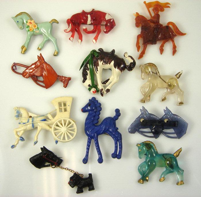 Appraisal: plastic costume jewelry horse pins one with a scottie attached