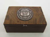 Appraisal: A walnut veneered cedar lined cigar cigarette box the lid